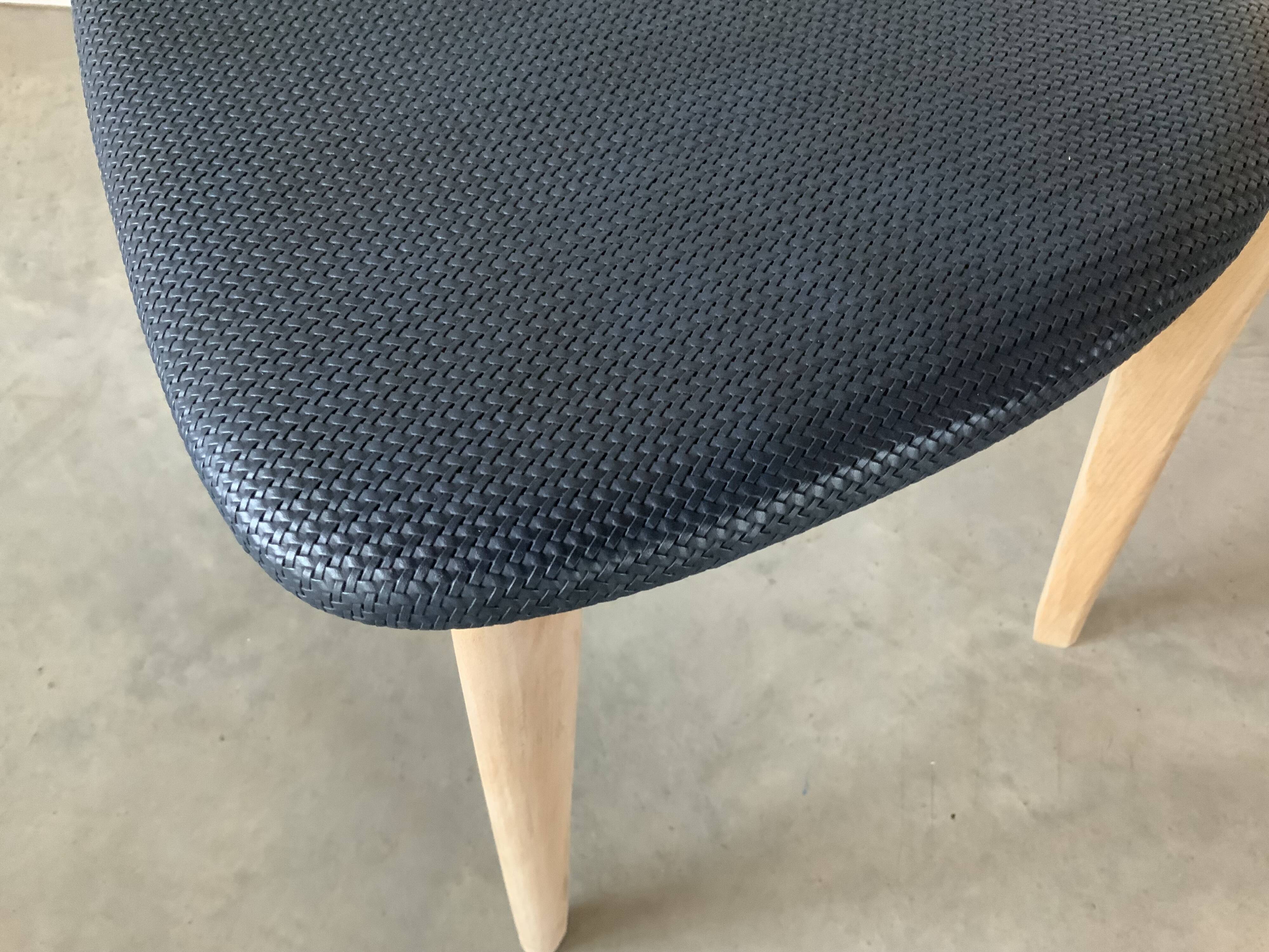 Restored vintage chair in midnight blue vinyl from the 50s