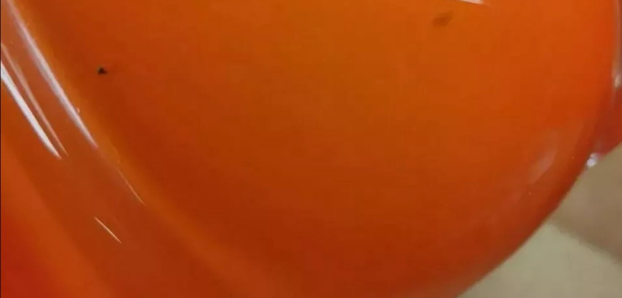 Pair of orange blown glass vases