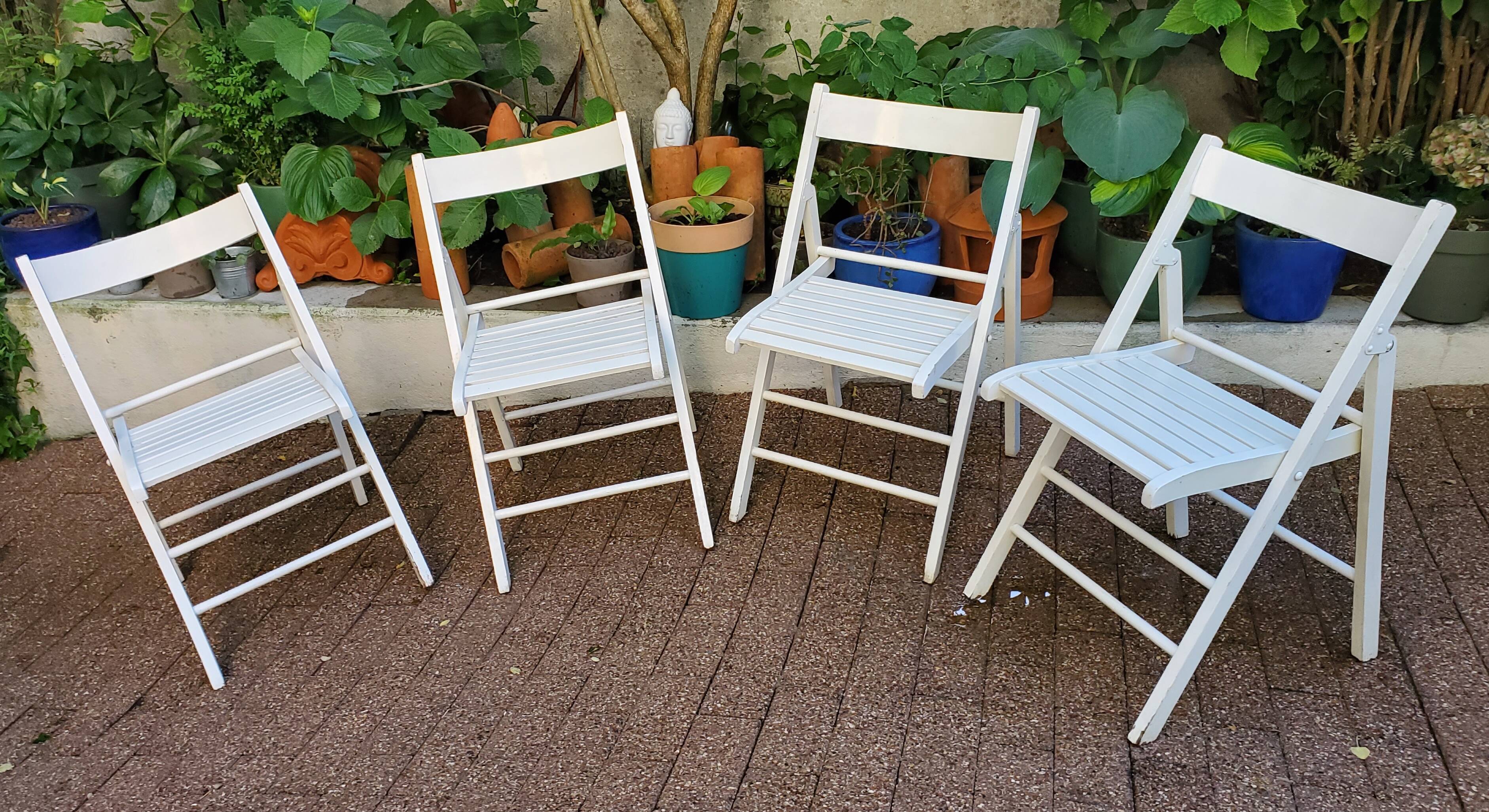 4 folding chairs made of 70's wood