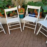 4 folding chairs made of 70's wood