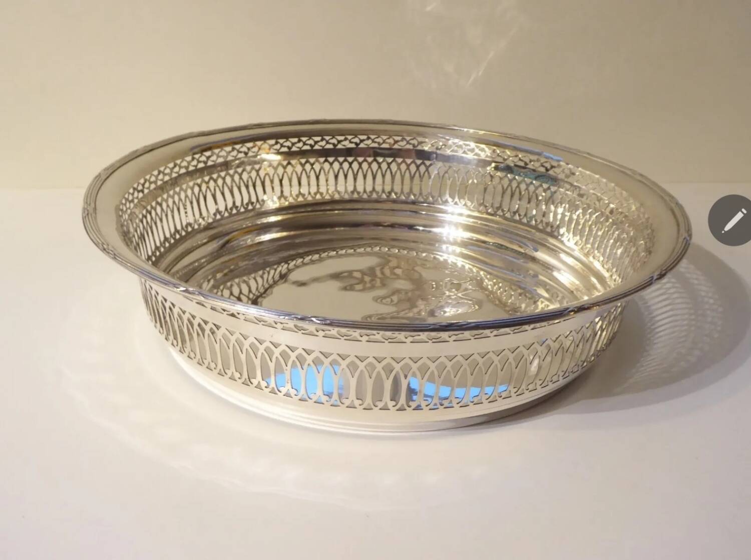 Large openwork basket in silver metal