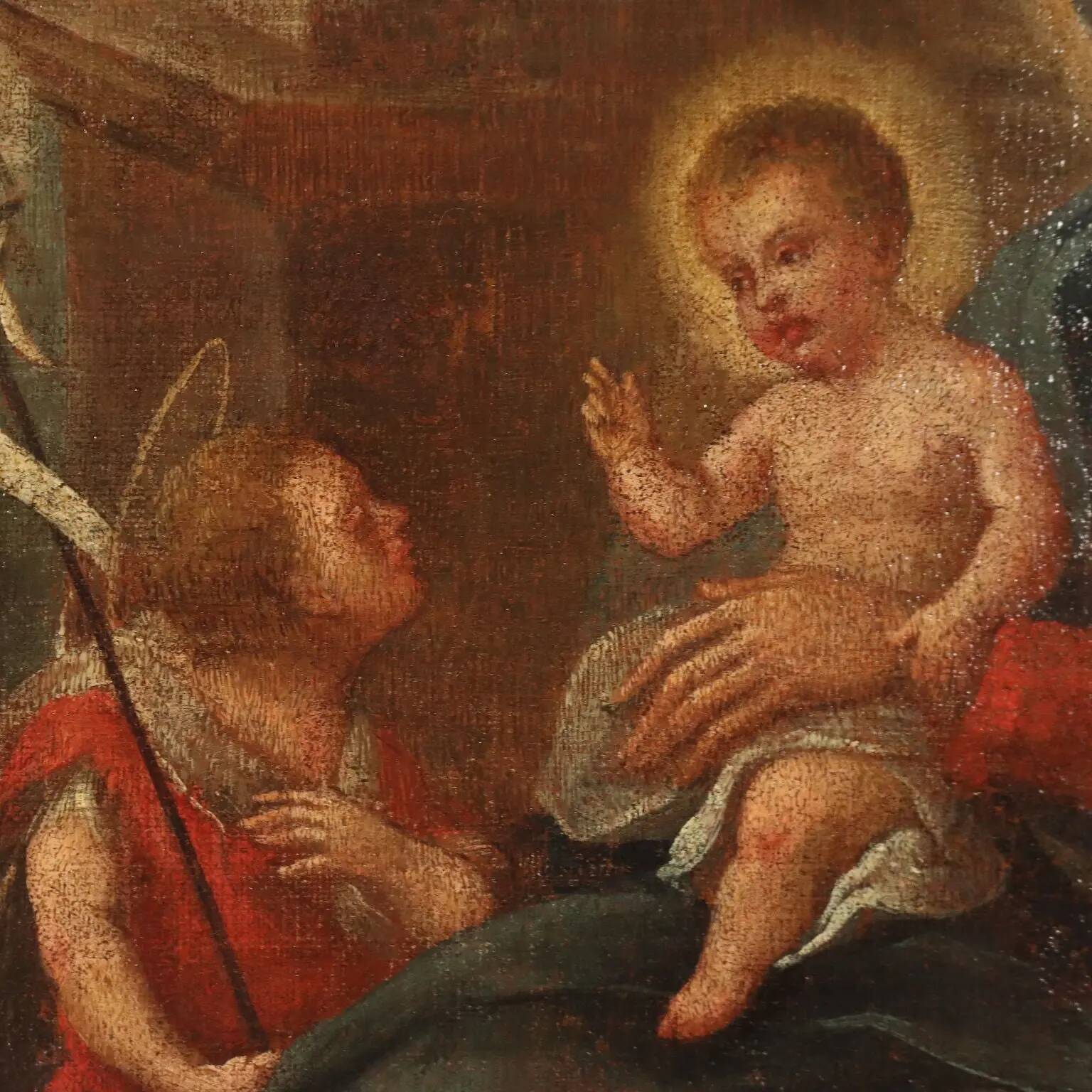 The Holy Family with saints, old painting from the 17th-18th century.