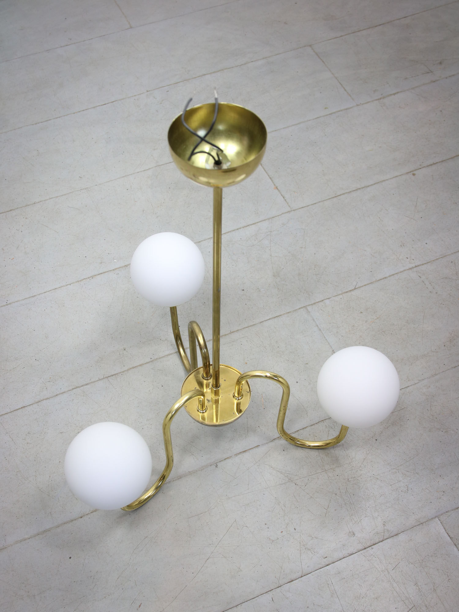 Vintage golden chandelier in opaline glass