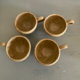 Four ceramic cups
