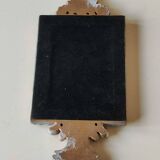 Louis XVI/Baroque style rectangular mirror. In polyresin with golden patina/Cérusée. Fronton knot. Dim. 47 x 14 cm