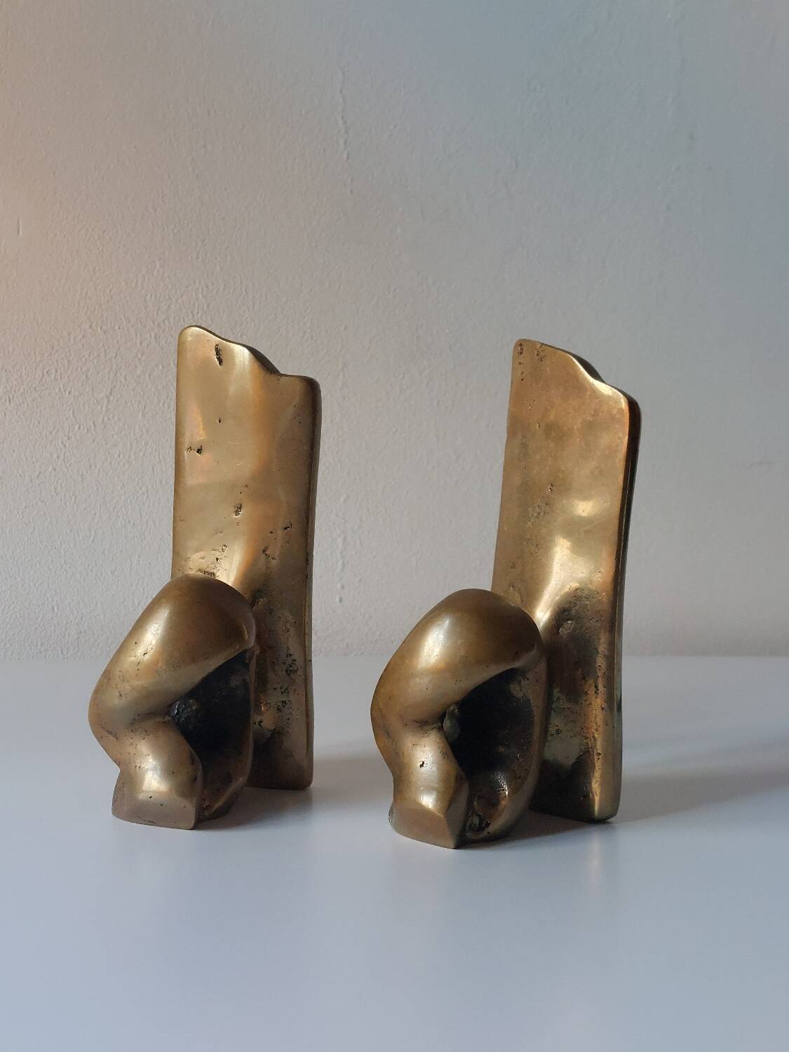 Super rare pair of brutalist brass bookends by David Marshall.