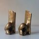 Super rare pair of brutalist brass bookends by David Marshall.