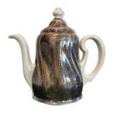 Silver-plated ceramic jug