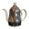 Silver-plated ceramic jug