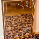 Beveled mirror with gold borders
