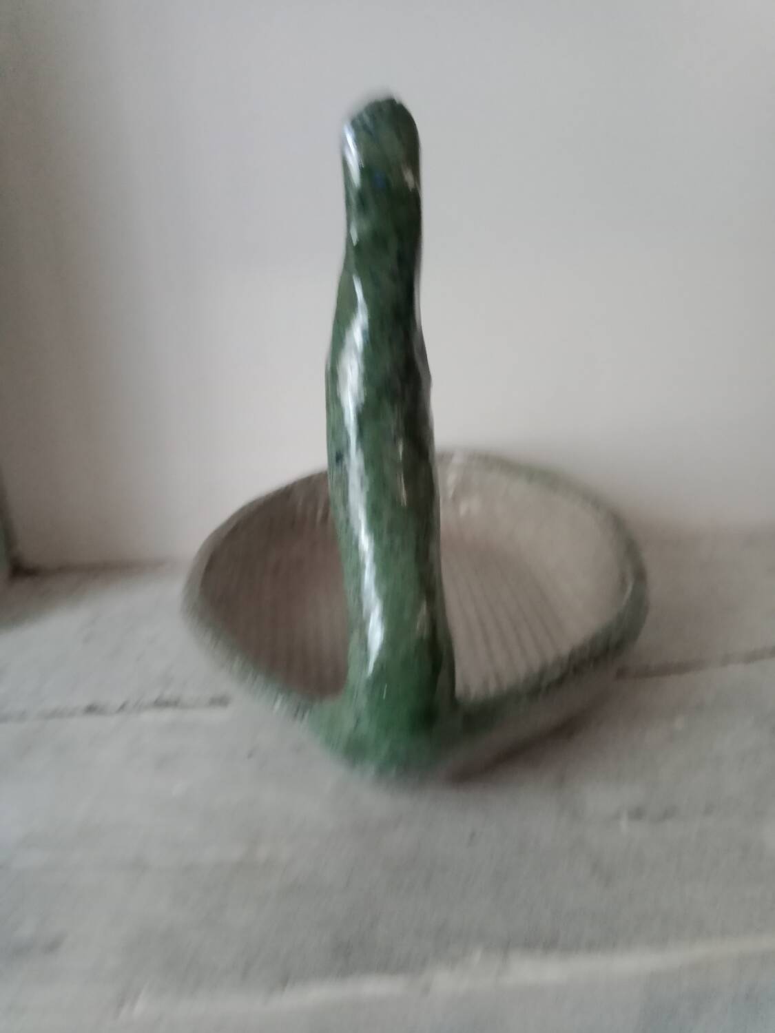 Empty pocket cup forming a bird