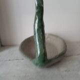 Empty pocket cup forming a bird