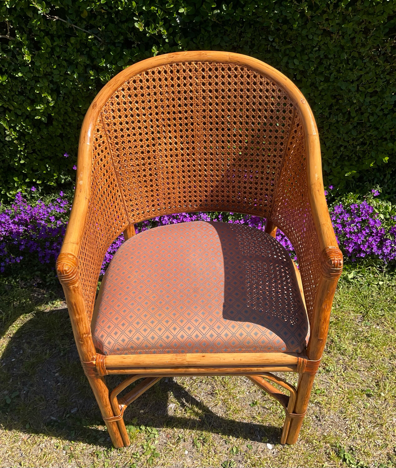 Mc Guire style armchair in rattan and caning from the 1980s.