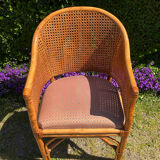 Mc Guire style armchair in rattan and caning from the 1980s.