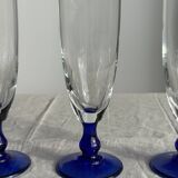 Set of 6 blue-footed champagne flutes; 3 pairs of designs.