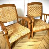 Two contemporary teak and rattan armchairs