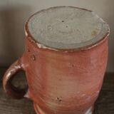 Terracotta pot with rounded handle