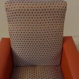 Retro vintage rockabilly armchair in orange faux leather and vintage fabrics