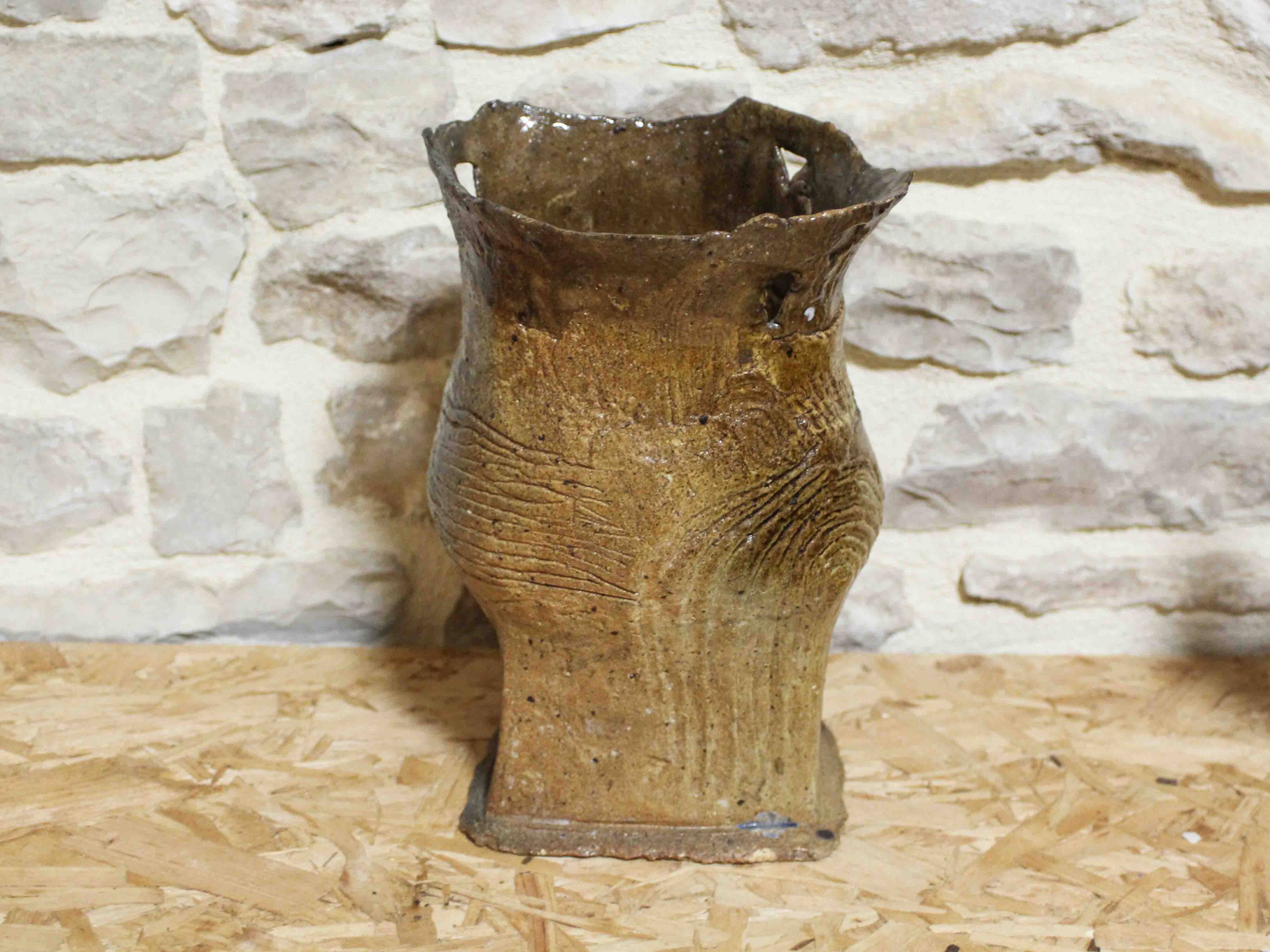 Vase made from a slab of scarified stoneware