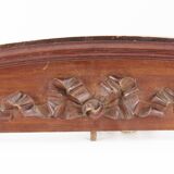 Wooden knot frontoon