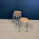 Set of 5 wooden school stools with gray metal legs