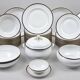 45-piece table service in Limoges porcelain by Chastagner, blue and gold.