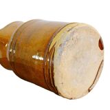 Pichet ancien en faïence française à glaçure orange