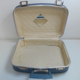 1960s flight attendant and vanity suitcases