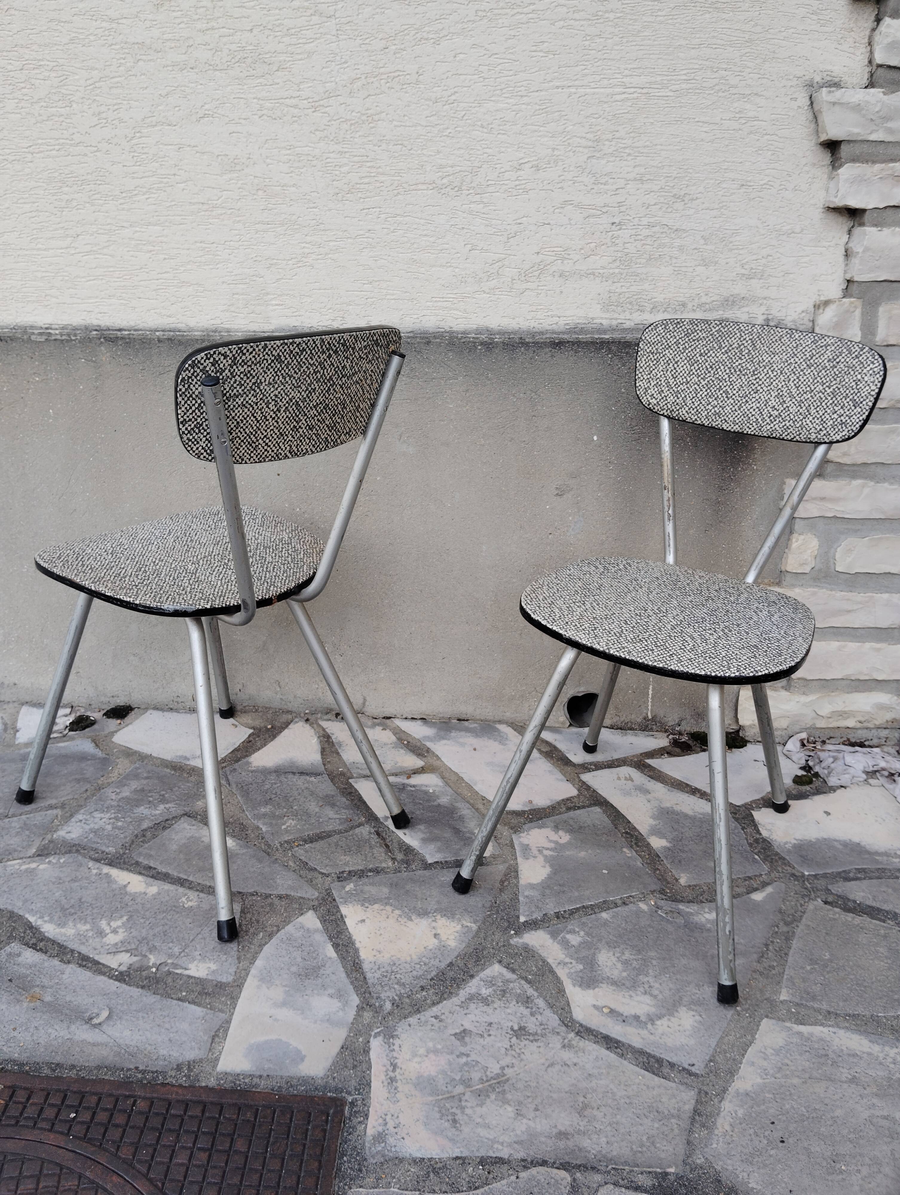 Pair of faux leather and metal chairs, 1950s-60s