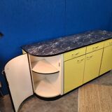 Vintage yellow sideboard, and black marble top.