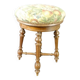 Old upholstered piano stool