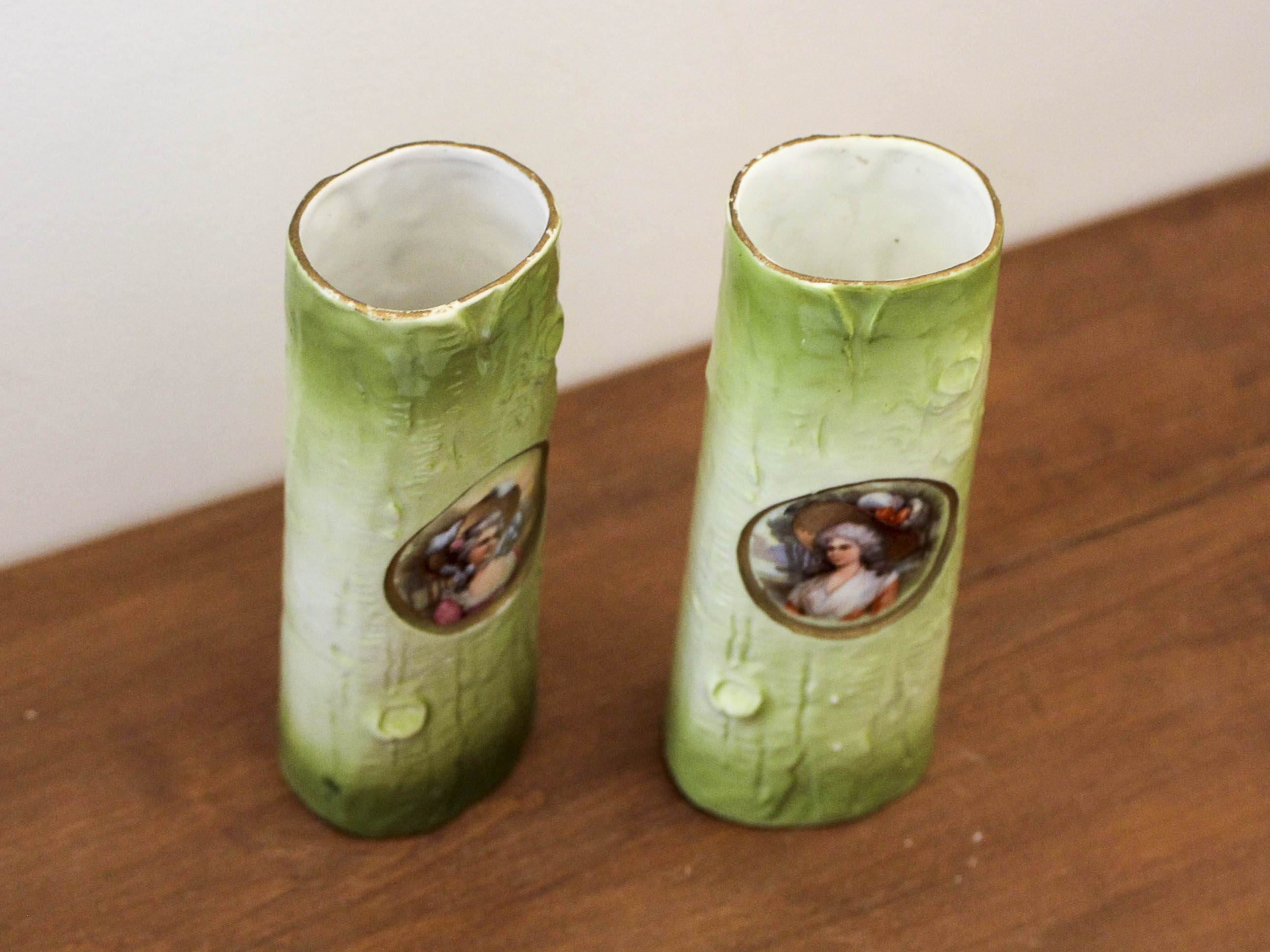 Pair of porcelain vases with portrait decoration of a woman