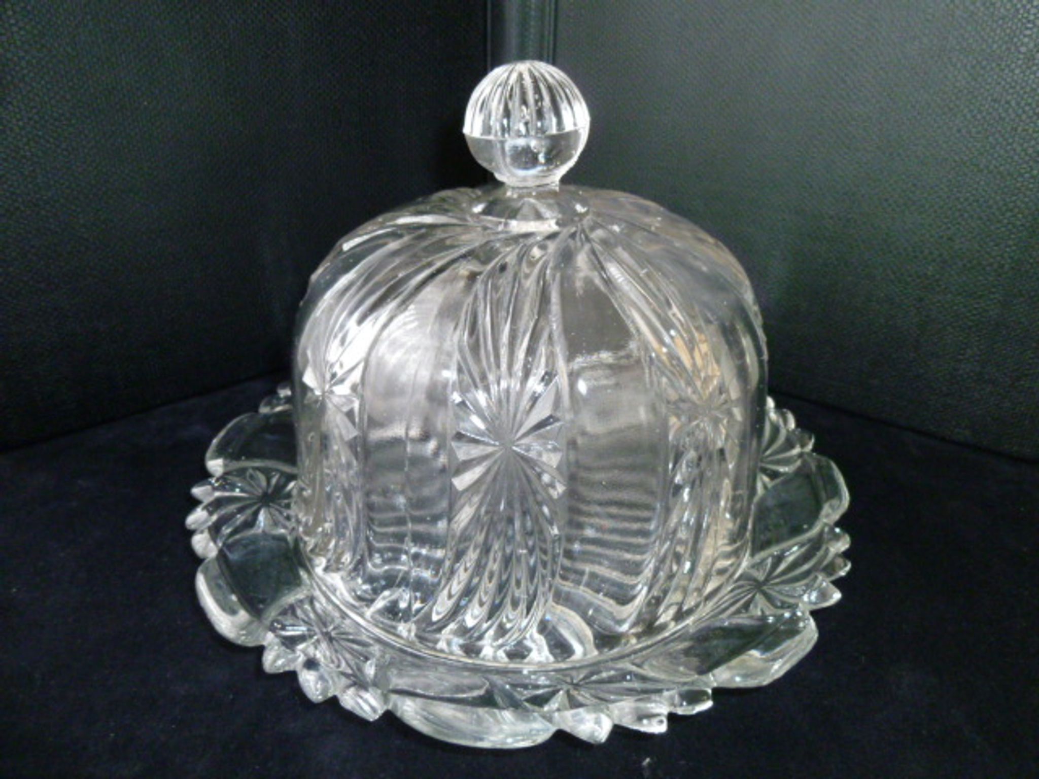 Old cheese bell on its molded pressed glass tray