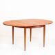 Table ronde/ovale de style scandinave av rallonge. Bois de teck. France, 60