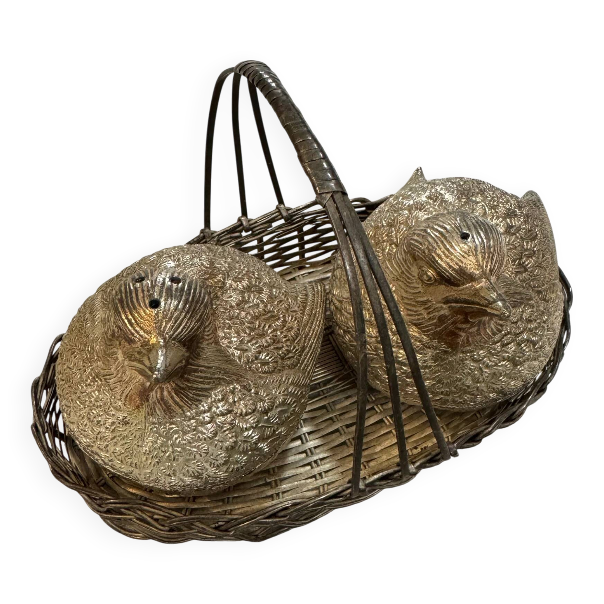 Vintage silver-plated salt and pepper shakers.