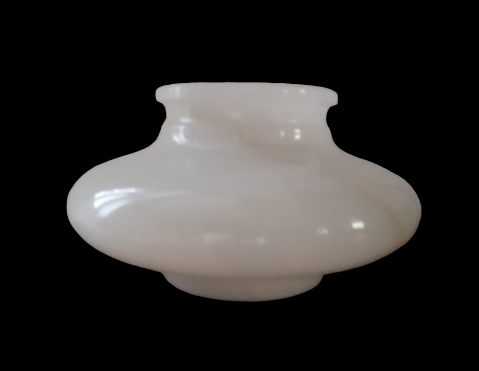 Flattened alabaster ball vase