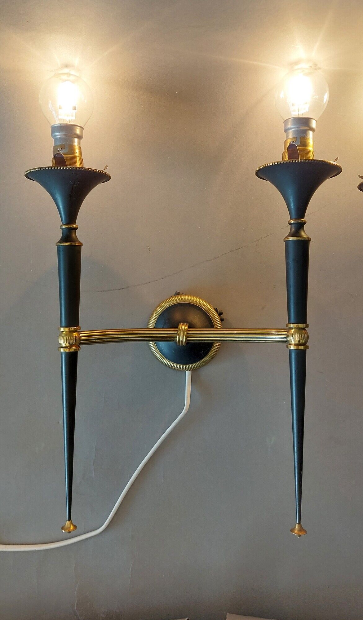 Pair of Maison Arlus torchiere sconces in gold brass and black lacquered 1960
