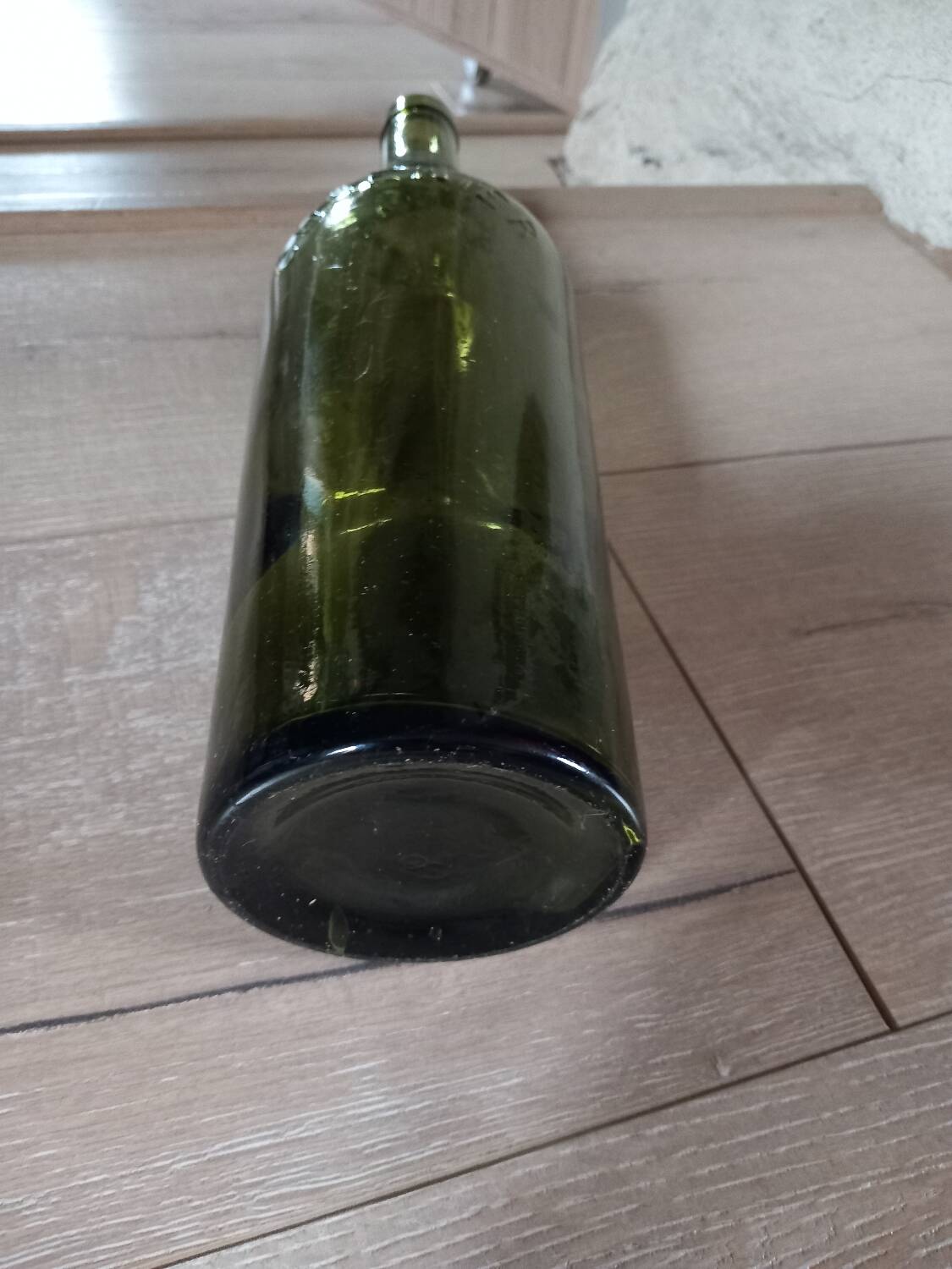 Old thick glass bottle