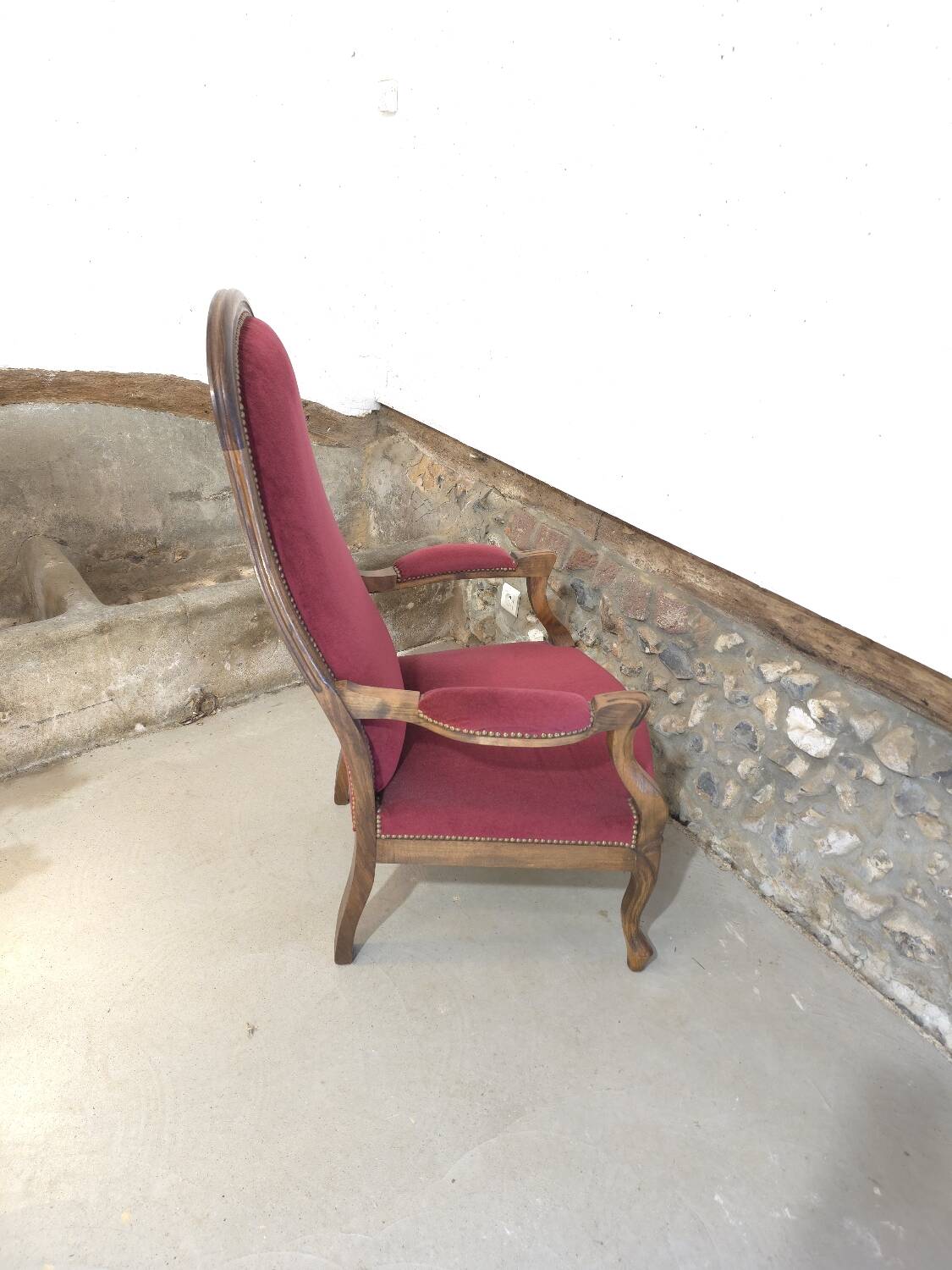 Voltaire red velvet armchair