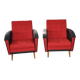 Pair of vintage red fabric armchairs with light wood legs from the 1960s.