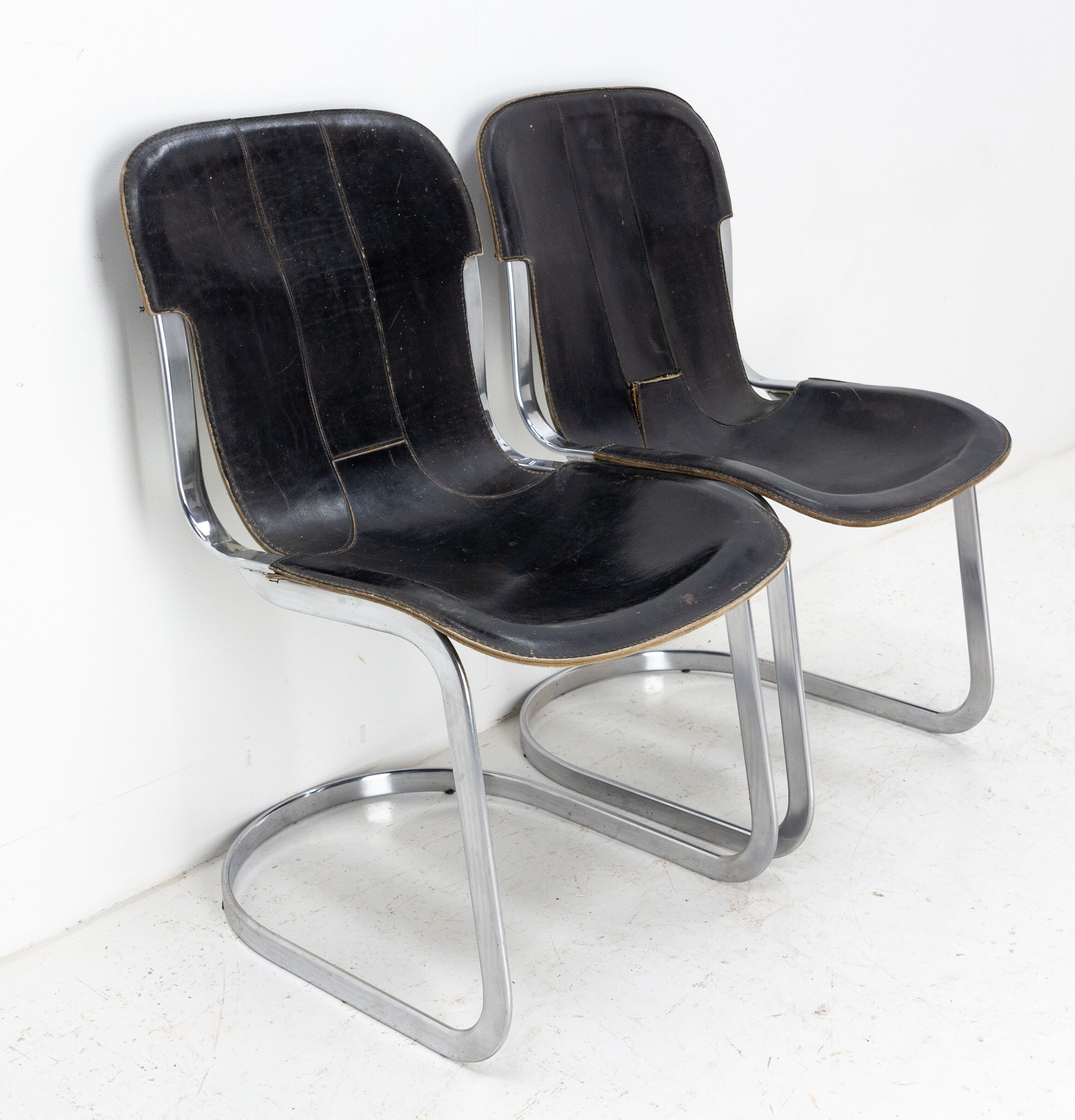 Pair of windmill leather chairs