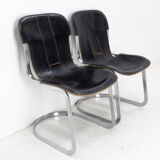Pair of windmill leather chairs