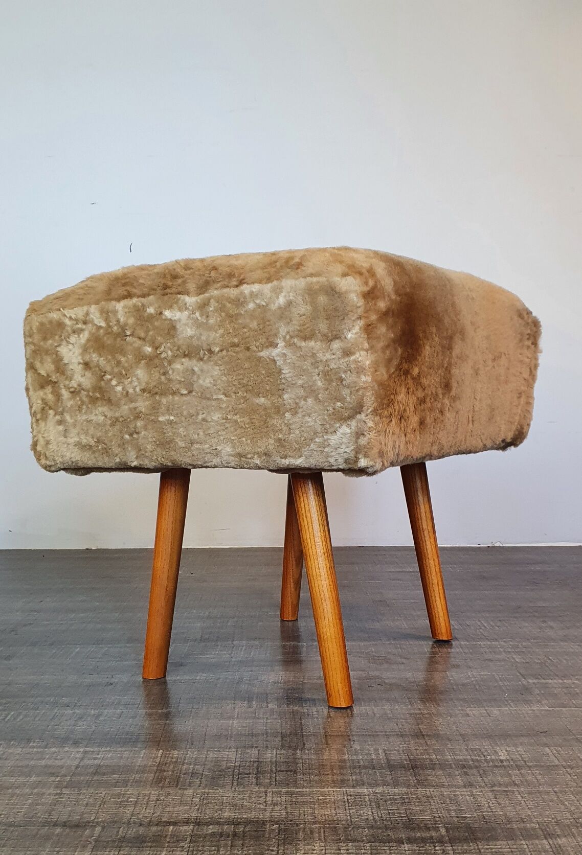 Norwegian sheepskin wing armchair with ottoman 1950