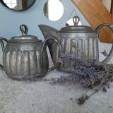 Art deco objects in their art tin juices