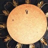 50s “witch’s eye” sun mirror. deknudt hollywood regency