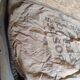 Vintage postal bag trade object of La Poste in mixed-race canvas burlap