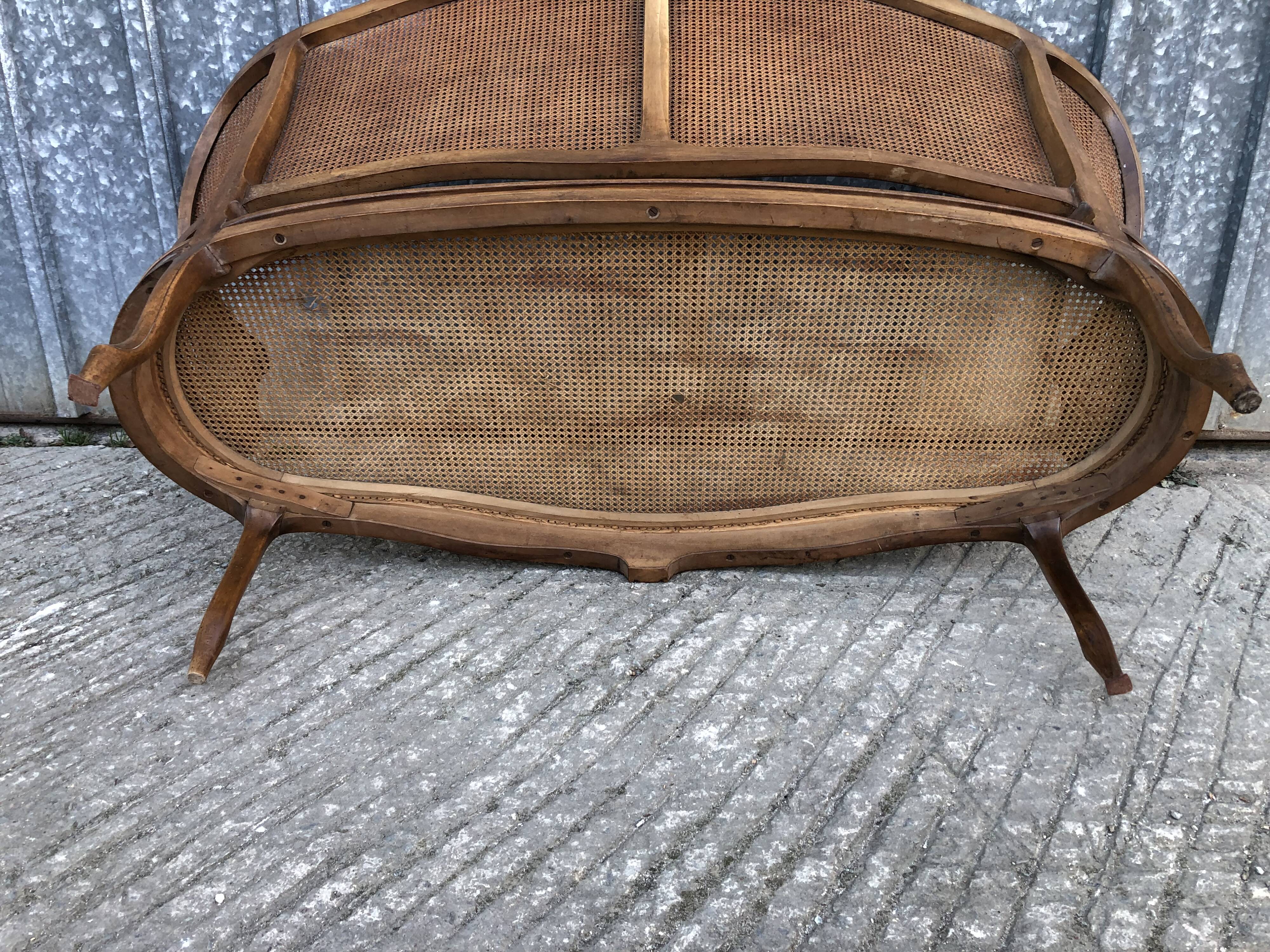 Antique Louis XV bench in solid walnut and caning