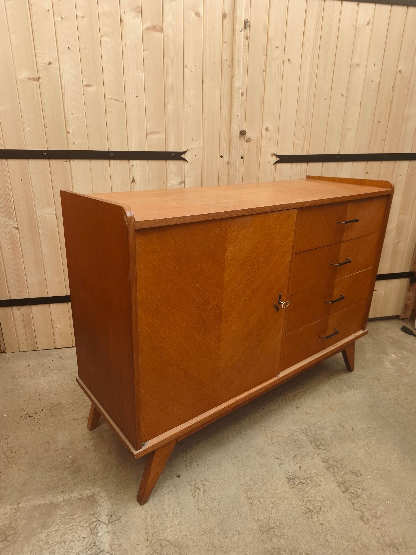 Vintage Scandinavian buffet with tapered legs.