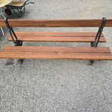 Antique double garden bench from the city of Paris in cast iron and wood