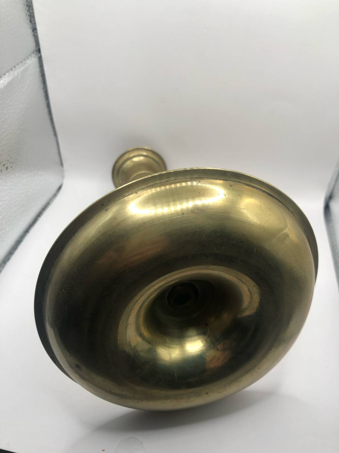 Candle holder with a pusher